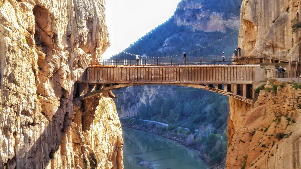 Caminito del Rey is a breathtaking walkway perched along the steep walls of Spain’s El Chorro Gorge in Andalusia. Known as the “King’s Little Path,” it offers thrilling views of cliffs, rivers, and lush landscapes. Recently renovated for safety, the route combines adventure and natural beauty, attracting hikers and nature lovers seeking a unique, unforgettable experience just a short drive from Málaga and the Costa del Sol.